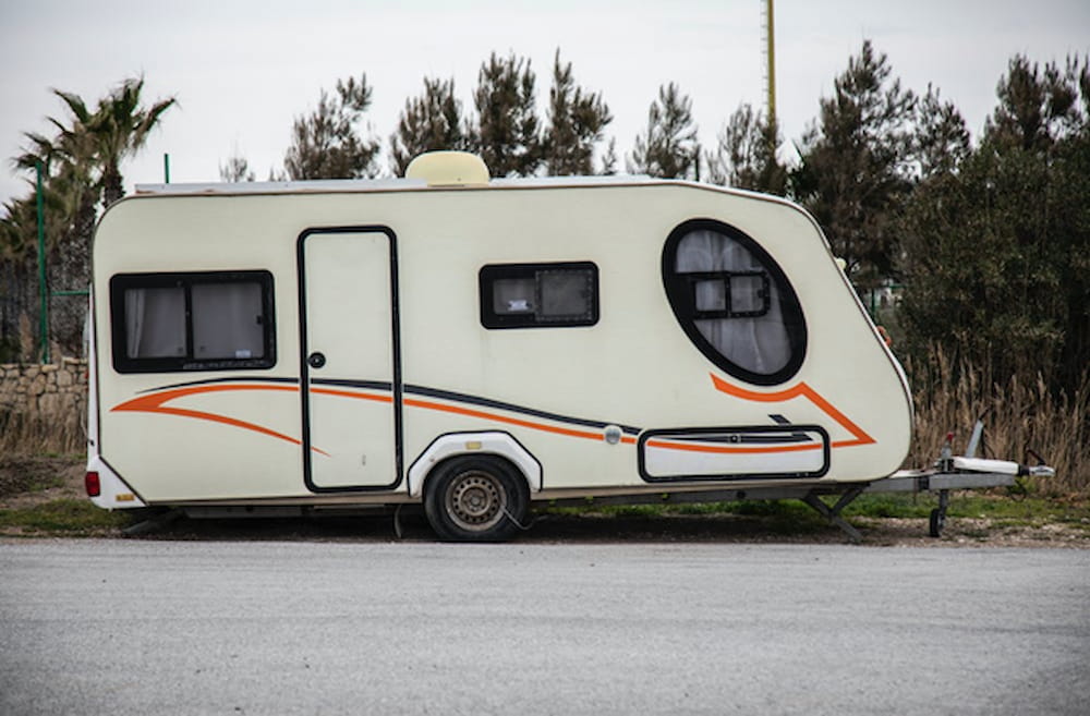 A travel trailer awaiting winter vehicle storage
