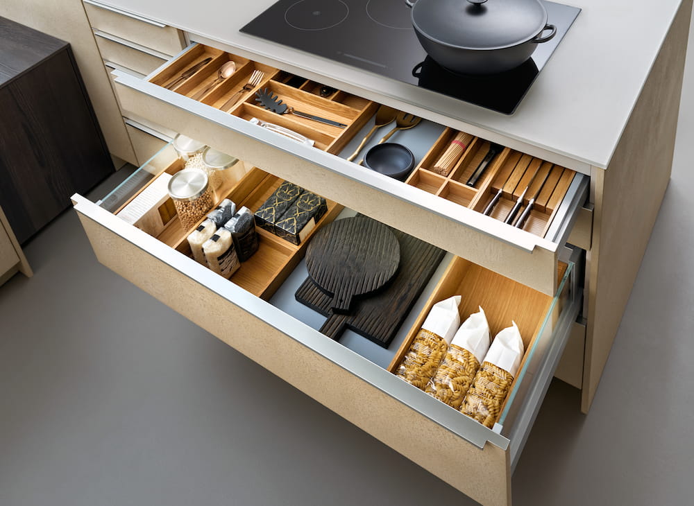 organized kitchen drawers with utensils and ingredients