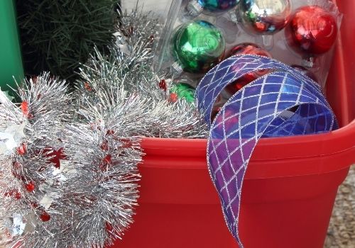 ornaments in a red tub for storing in basement