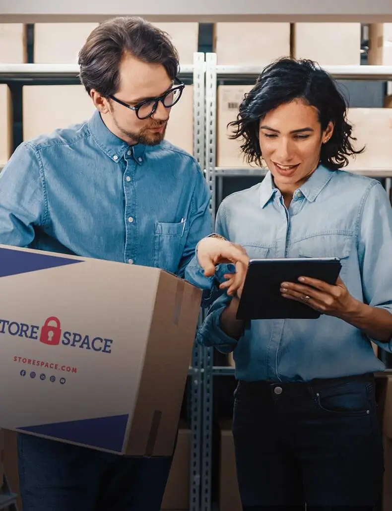 people looking at a tablet together