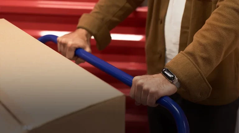 close up of someone pushing a cart