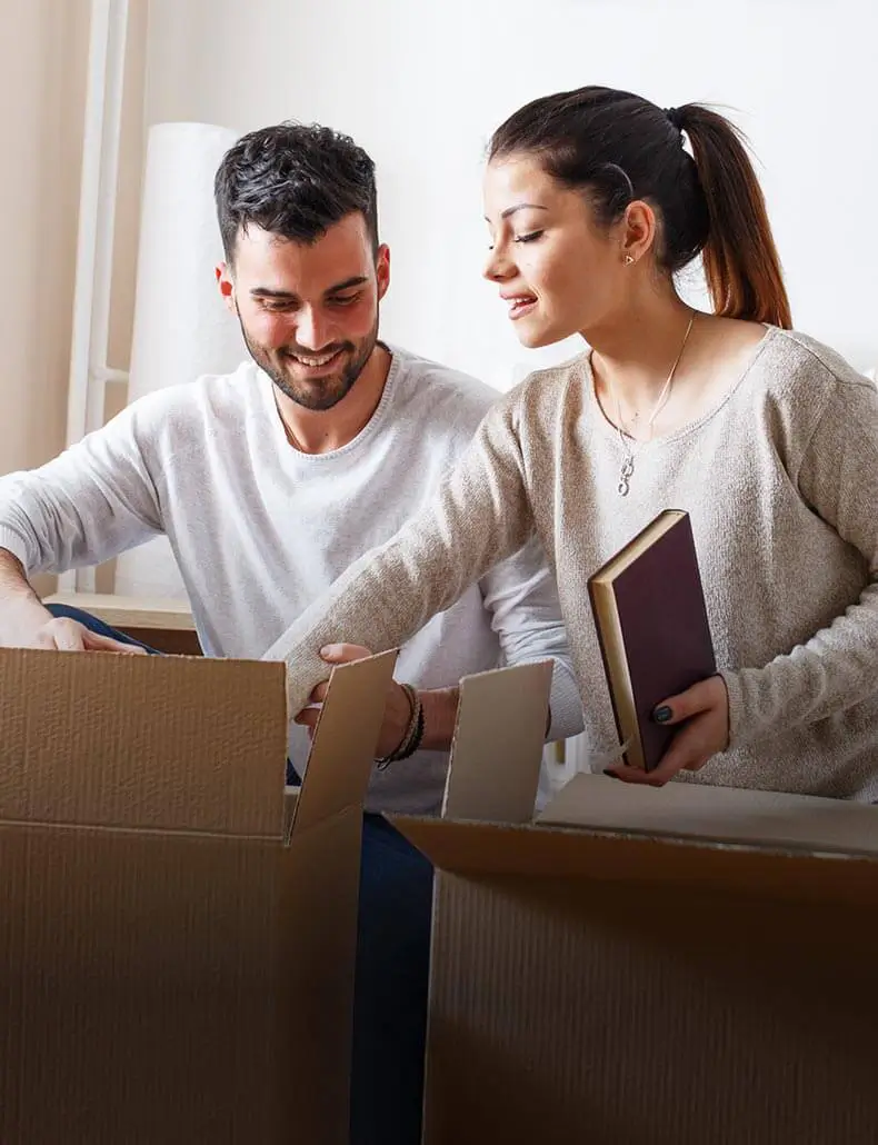 couple looking through boxes