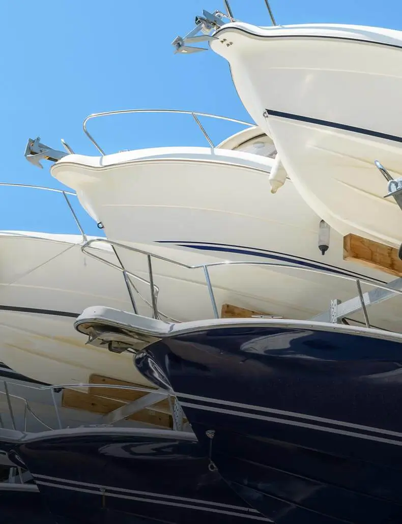 boats stacked on top of another