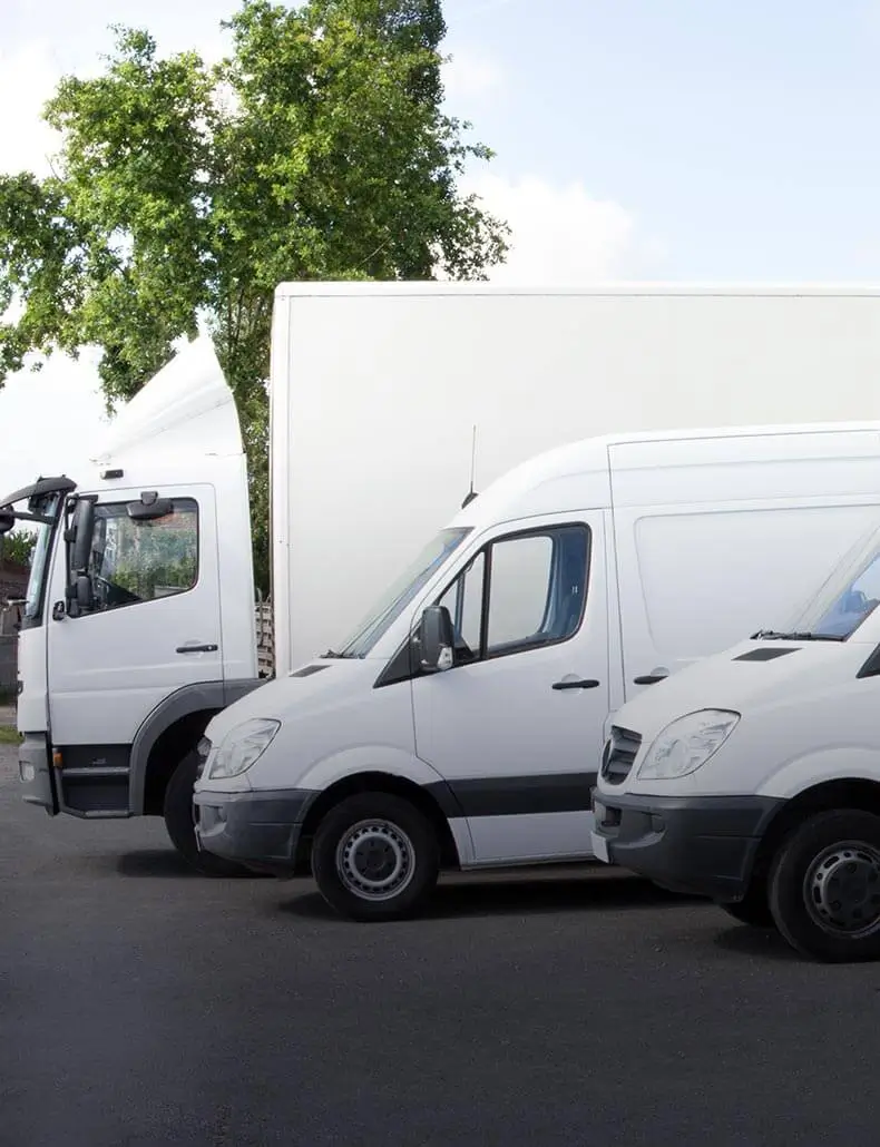 vehicles parked next to each other