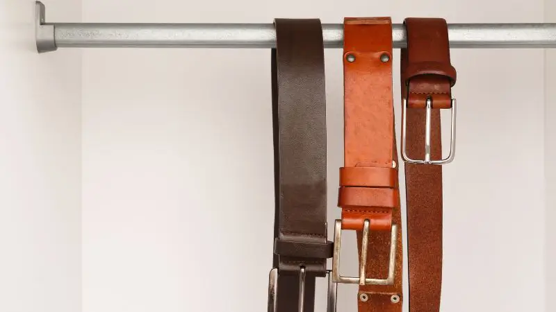 belts hanging in closet