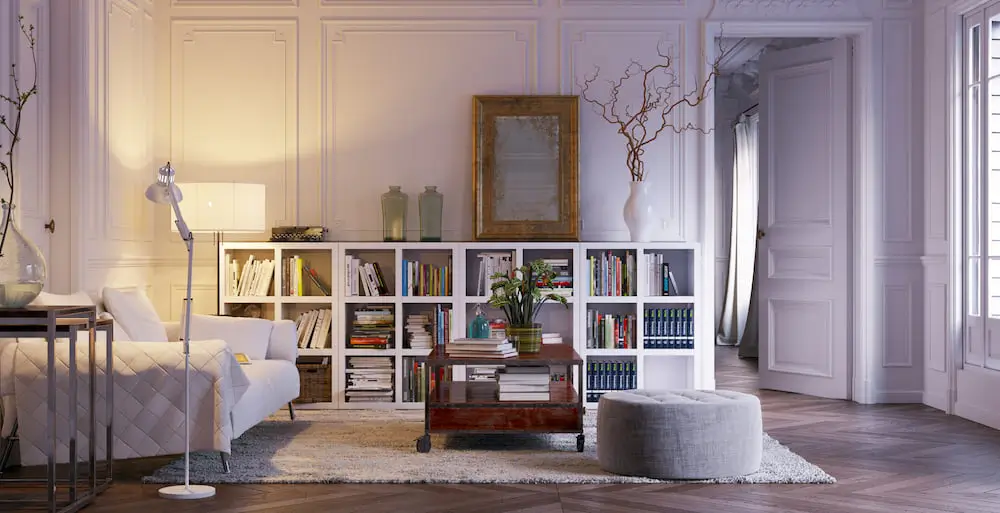 living room with a large bookshelf full of stuff