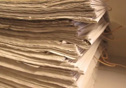 storing collectible newspapers in acid free boxes