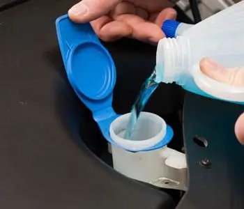 pouring antifreeze into RV camper