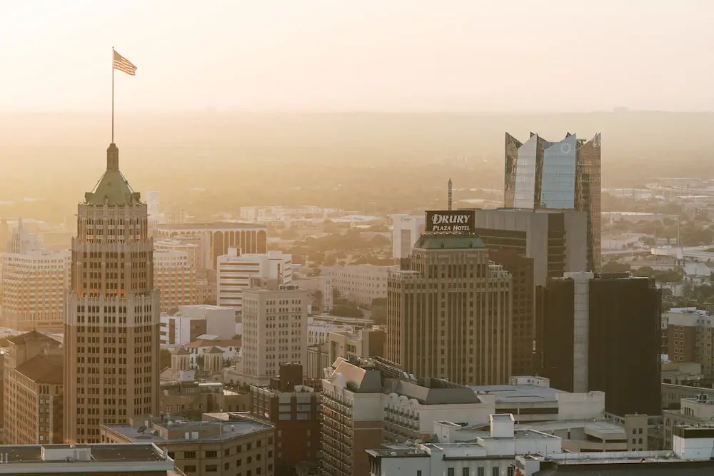 A view of the San Antonio skyline with the Tower Life Building in the foreground