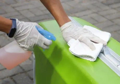 suitcase being cleaned