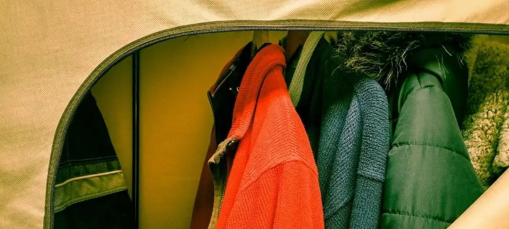 winter coats and jackets hung for storage